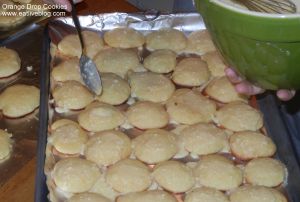 Orange Drop Cookies Getting Iced