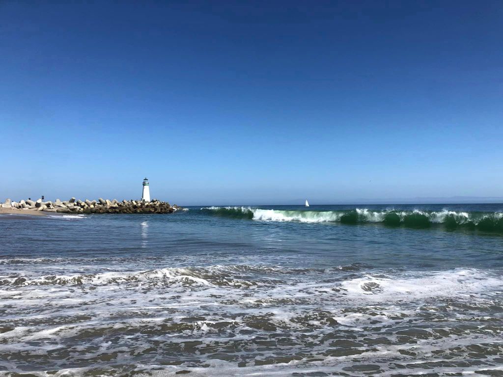 View of the Seabright Beach lighthouse, from the beach, in Santa Cruz, CA.